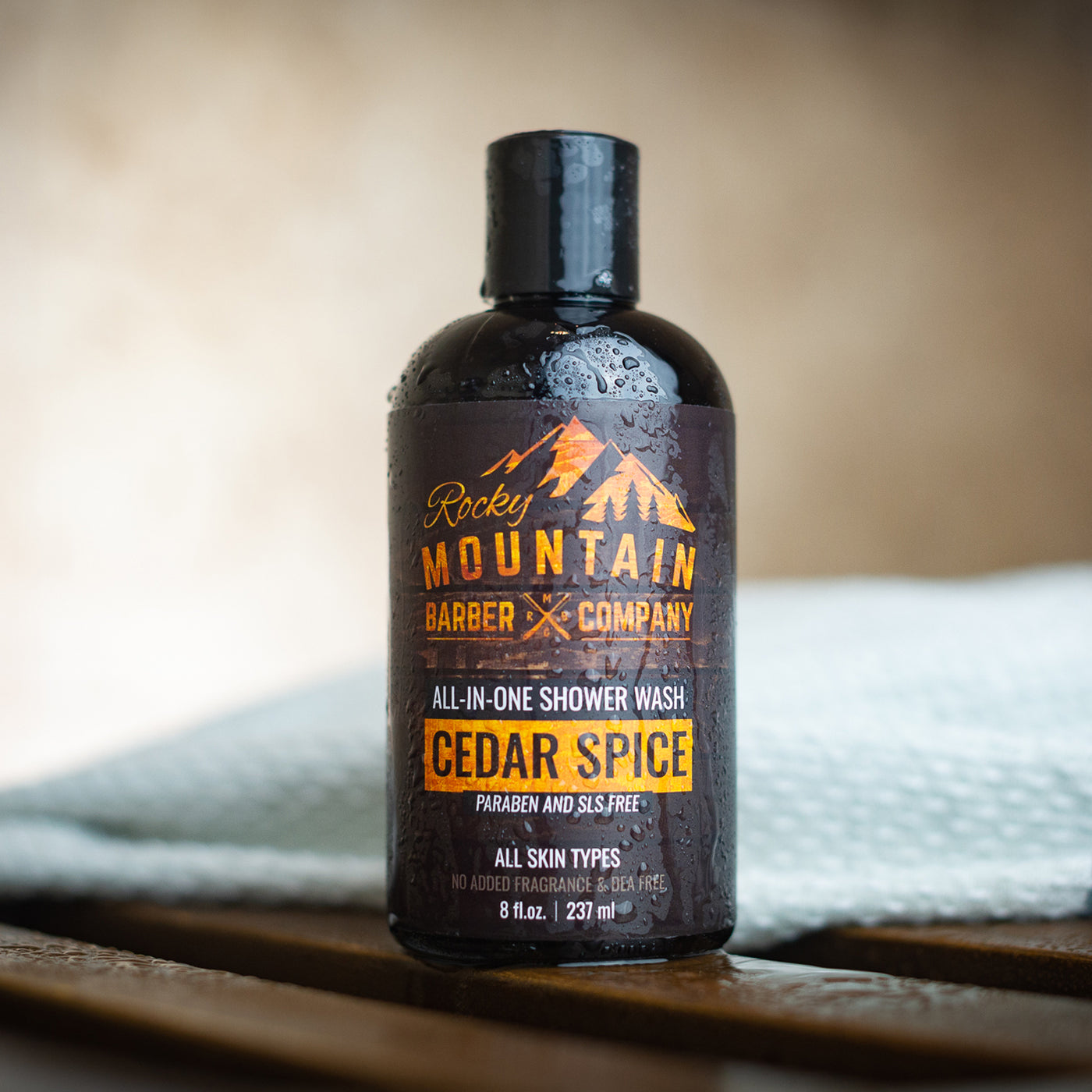 Rocky Mountain Barber Company Cedar Spice Shower On Shower Bench With Towel